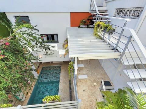 Private pool on 1st level and patio on 2nd level, showcased from upper level.
