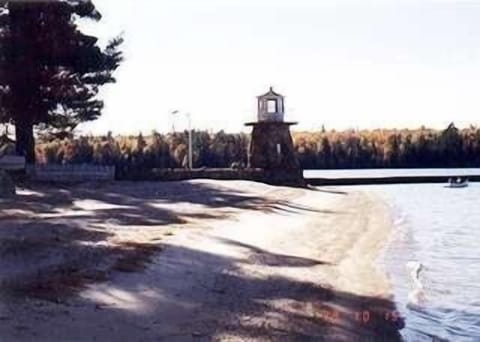Beach with view of lighthouse