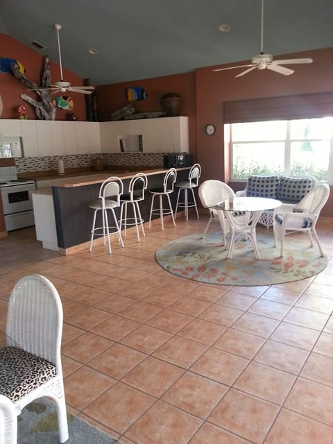 Pool house-full kitchen and restrooms