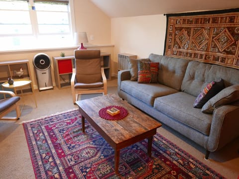 Bright Eclectic living room with all new furnishings