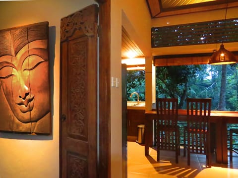 Villa gate opening onto the living/dining area.