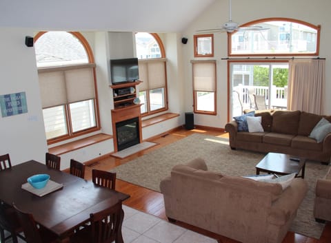 Main room has 3 couches for entertaining and seating for 8 at the table.