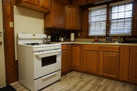 Back door leads to fenced yard