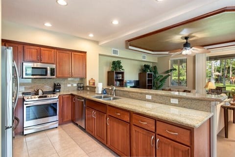 Large gourmet kitchen, granite counter tops with new stainless steel appliances.