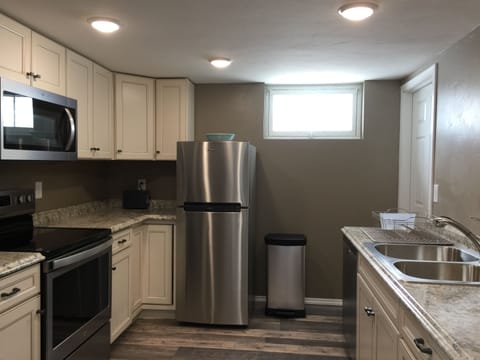 New appliances, cabinets and countertops. Stocked with spices, linens, and coffe