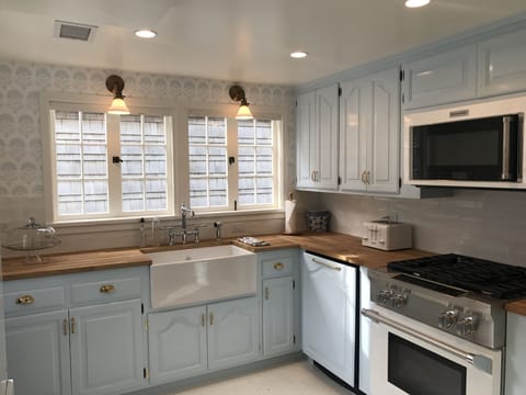 Chefs kitchen with farmhouse and all new appliances