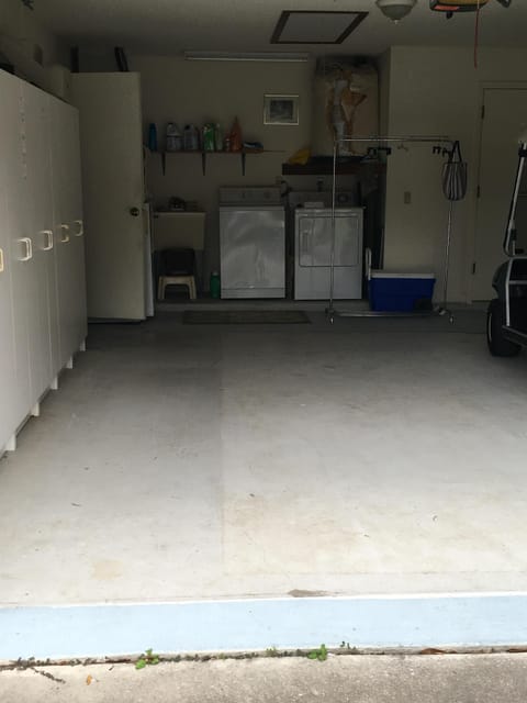 two car garage with washer dryer