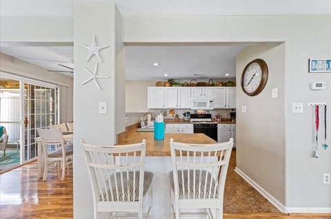 Two barstools for more seating (10 chairs total)