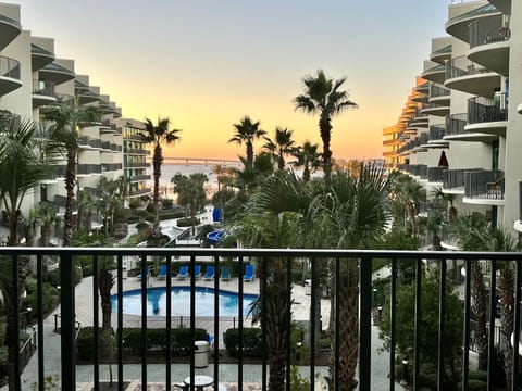 View the bay and the beach right from the sofa and balcony!
