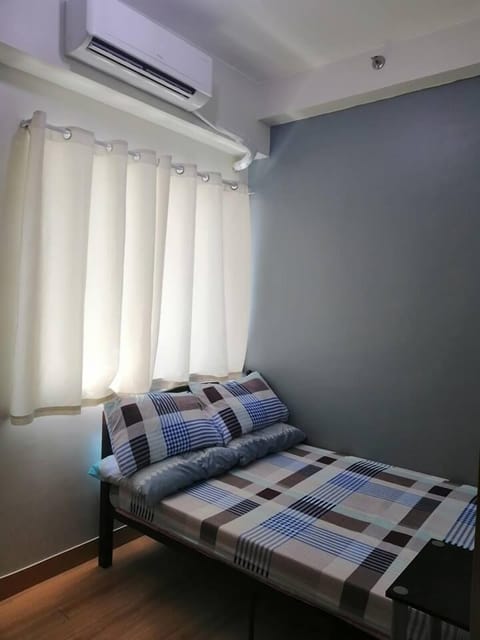 1-Bedroom with Den at Trees Residences