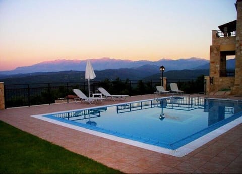 Pool with comfortable sun loungers