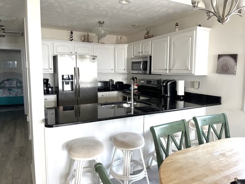 Open concept kitchen, fully stocked for all your cooking needs! Ocean views!