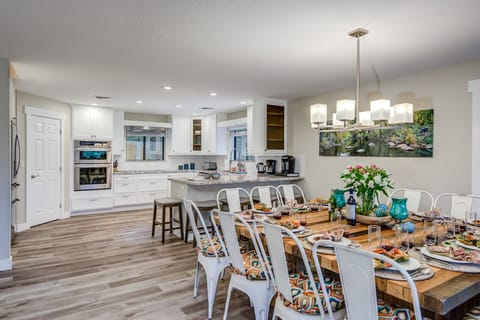 Upper Level - Great Gathering Space. Or Gather Outdoors with a Dining Table that Seats up to 12 and Plenty of Lounge Chairs