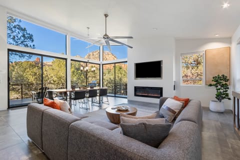 Contemporary Furnishings with TV and Gas Fireplace, Dining Area and Stunning Views