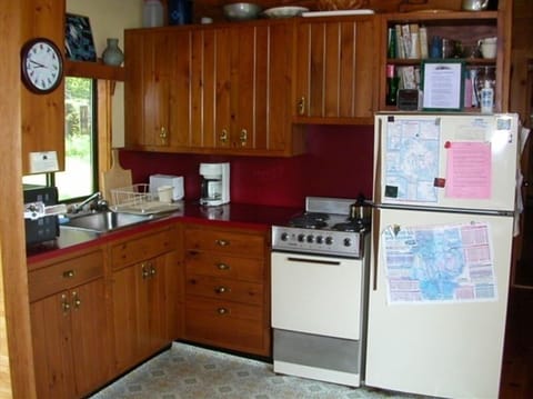 Kitchen area with oven, stove & microwave