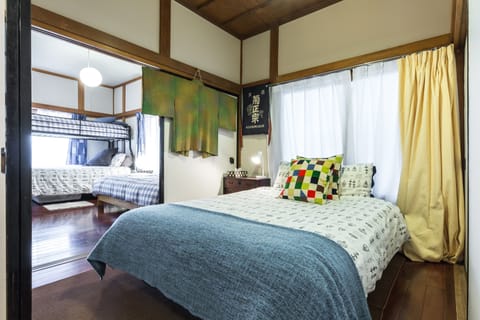 Dual bedroom view with playful design and homely touches