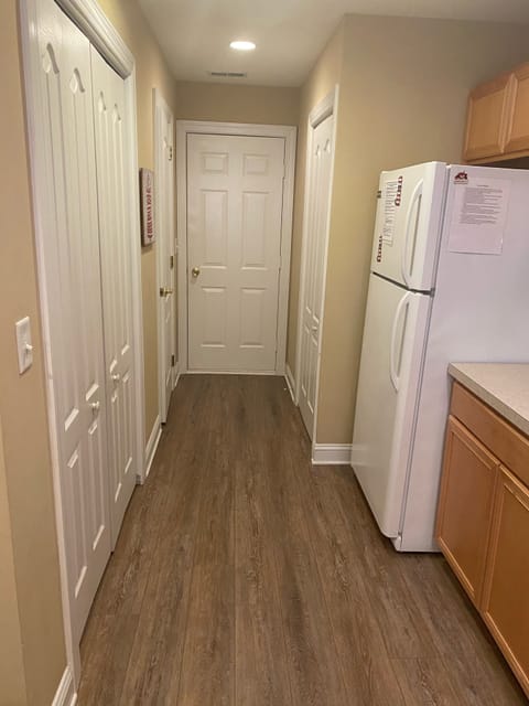 Kitchen hall to pantry, powder room, laundry & garage.