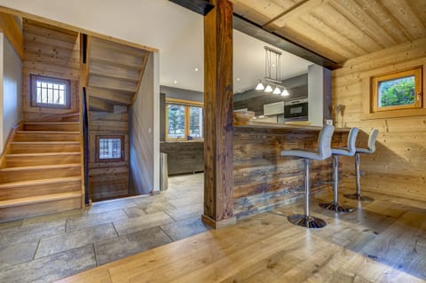 Stairs lead to first floor and 3 of the ensuite bedrooms