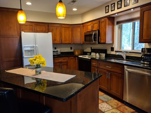 Refrigerator, toaster oven, microwave range, dishwasher, coffee maker