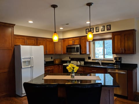 Large kitchen island with bar stools