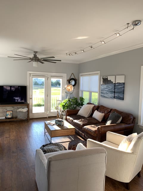 Living Room. 55'" Smart TV; Chill... it is a beach house.
