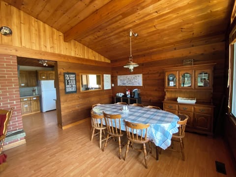Open concept, bright natural light, spacious dining seating for 10. Extra dishes