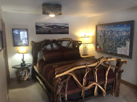 Unique queen bed made from the roots of one cedar tree! New Tempurpedic mattress