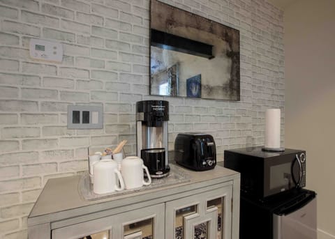 kitchenette includes: coffee maker, toaster, fridge, microwave