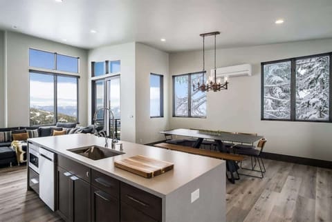 Kitchen has seating at the bar as well as dining area