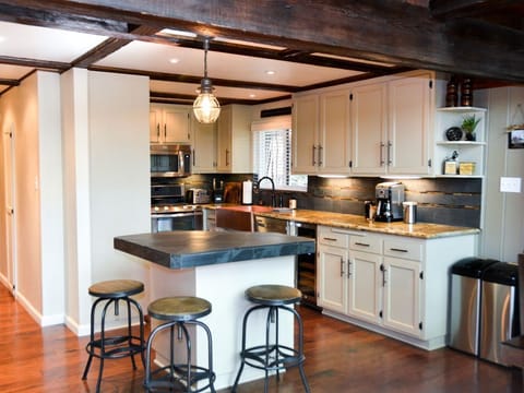 Gourmet kitchen with granite countertops and stainless steel appliances