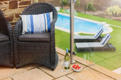 View to the privat epool from the front garden 