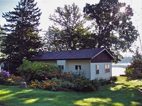 Lush garden behind the cabin, in view every time you drive up.
