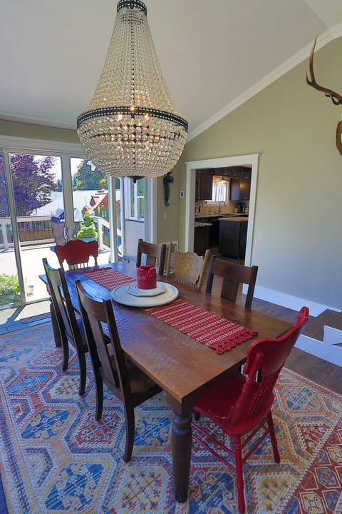 Dining for 8 with large sliding glass windows out to the Trex Deck!
