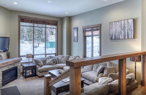 Family room - lots of seating, fireplace and TV