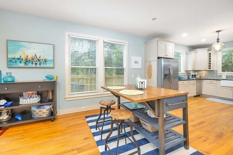 Open kitchen with bar seating