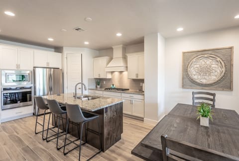 Dining Room View - With an open and spacious floor plan, the Dining Room and Kitchen can accommodate meal preparations for groups large or small.
