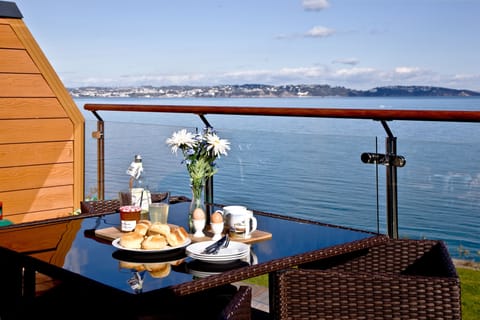Enjoy the stunning sea views over a morning coffee and pastry on the large balcony.