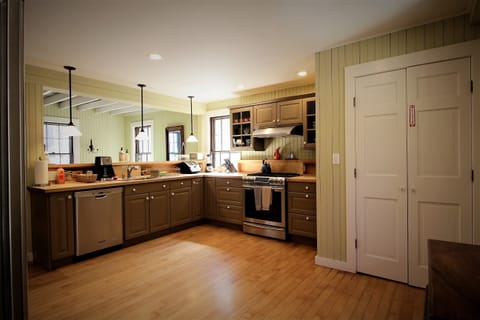 Kitchen with gas range has everything you need for preparing a feast.