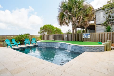 Heated pool with putting green!