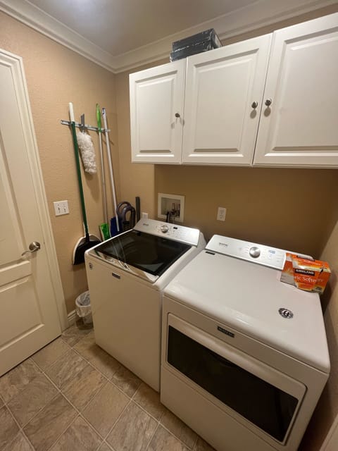 Laundry room stores:broom, vacuum, and cleaning supplies.Guests may use supplies