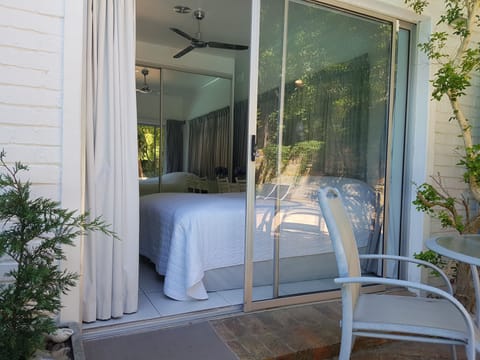 Pool-facing Bedsitter with own entrance & small bathroom