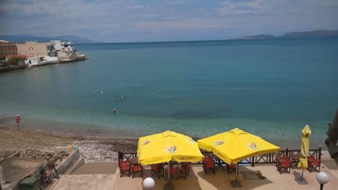 The small beach and the coffee in font of the building