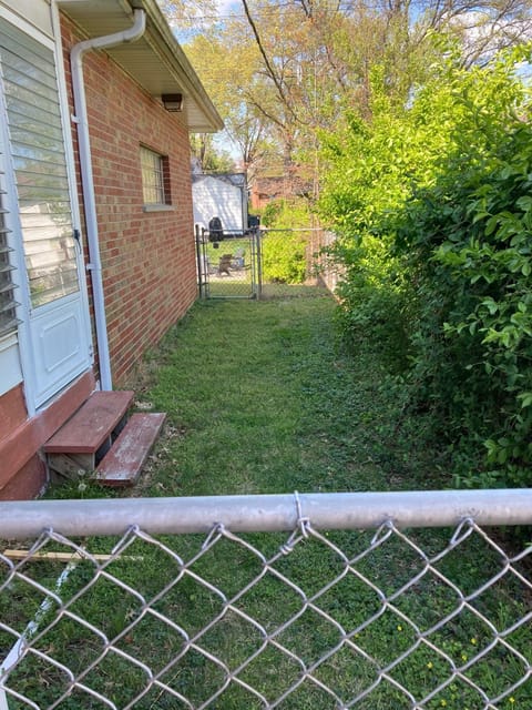 Small fenced side yard - approximately 9' X 30" - for secure pet area
