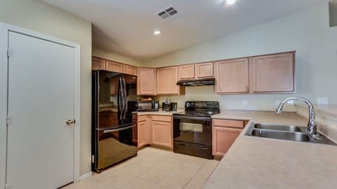 Kitchen view with pantry door on the left