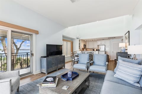 Living Room, Dining Area and Kitchen at 1883 Beachside Tennis