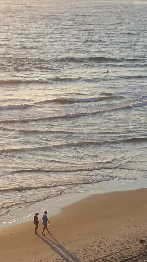 Relax on the beach or in my home.