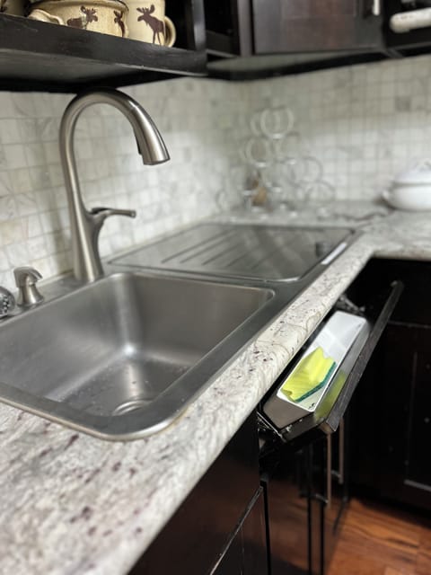 Tilt drawer to hide sponges.