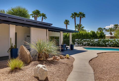 Front of Property with view of pool