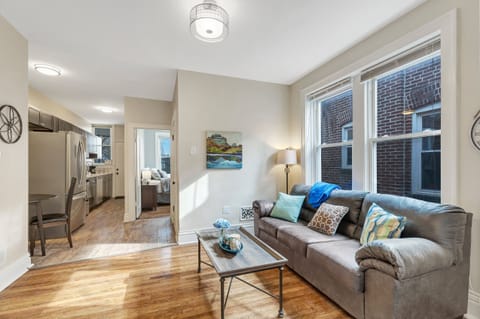 Enjoy the bright living room and plush couch.