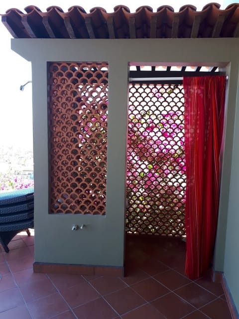 1st floor outdoor shower and toilet on the patio near the infinity pool